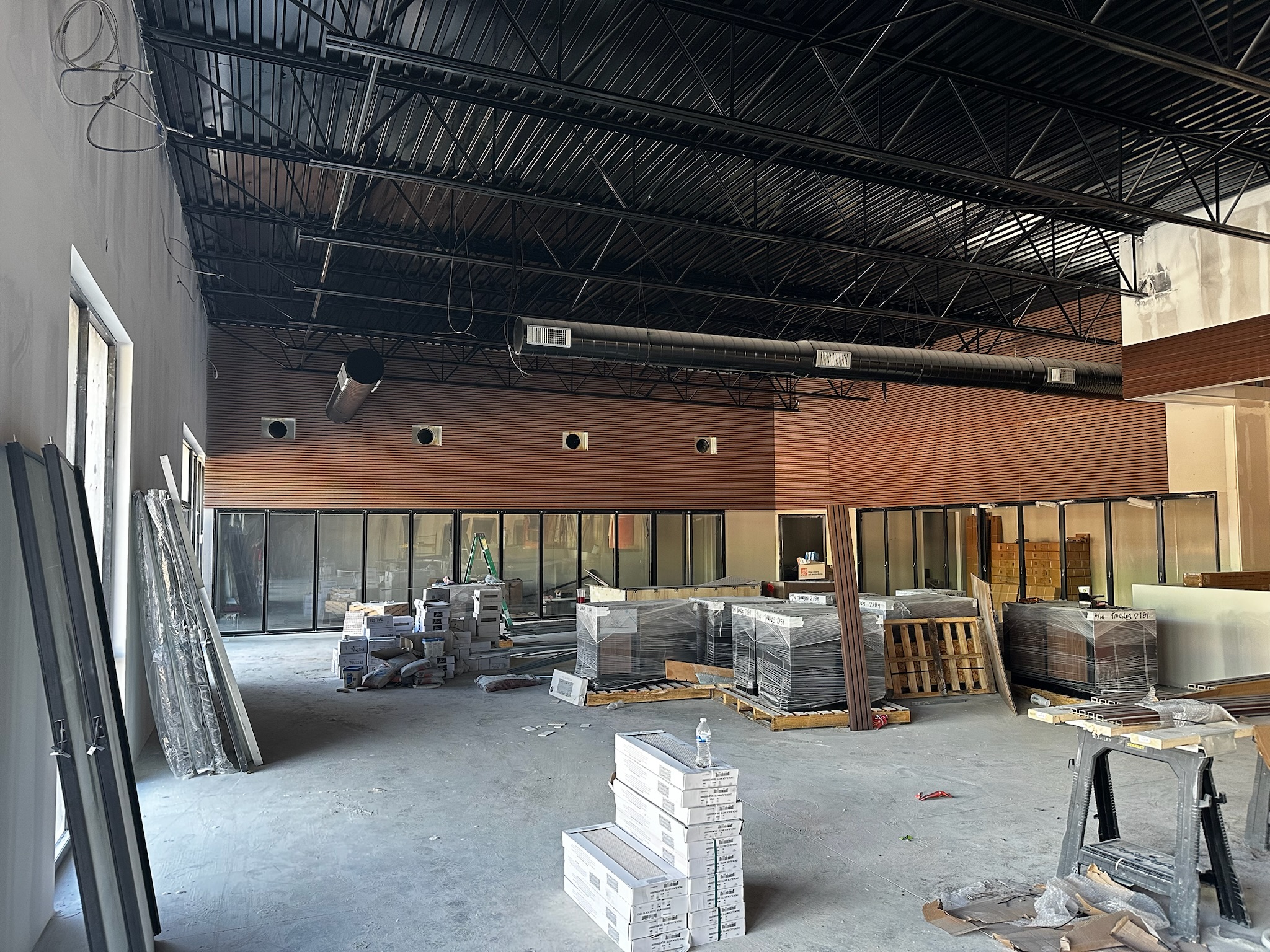 Gas station exterior with Teak 4-hole panels